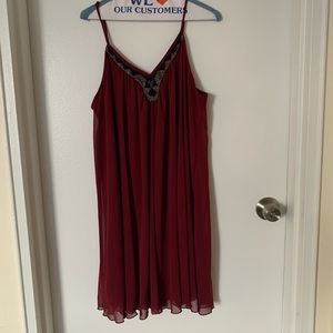 Short, sleeveless Express dress with beaded neckline